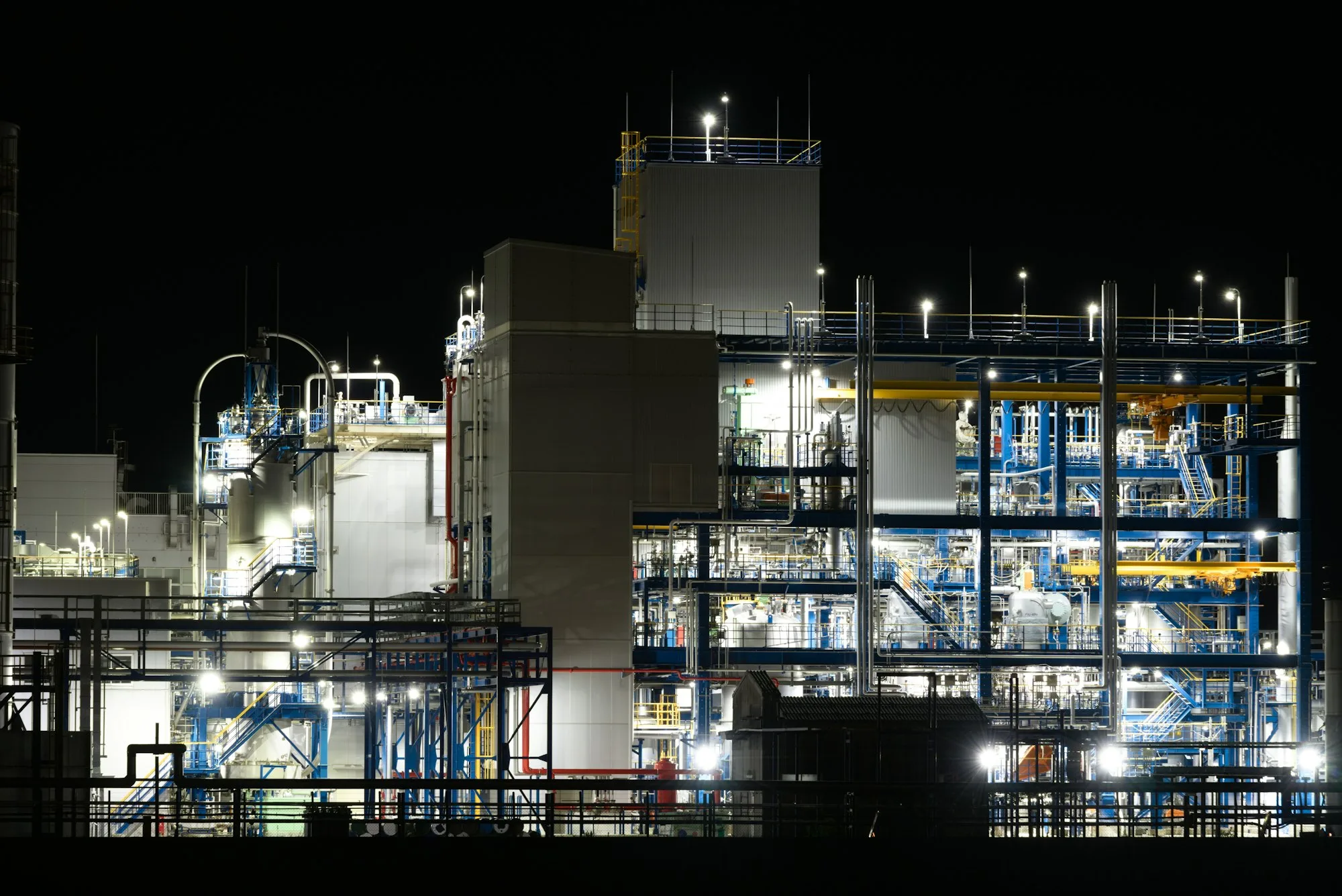 Industrial processing facility illuminated at night