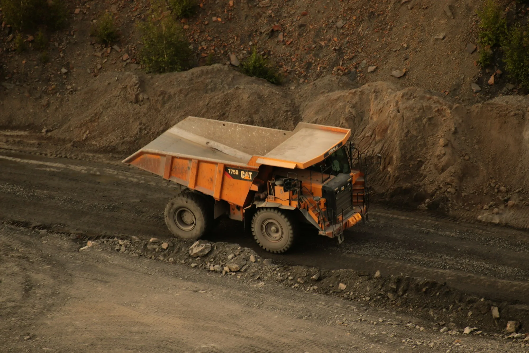 Haul truck moving material in an industrial quarry